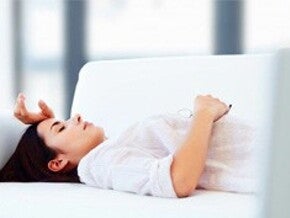 Femme allongee dans son lit
